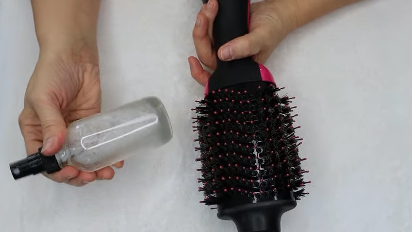 Brush the hair dryer with the detergent mixture